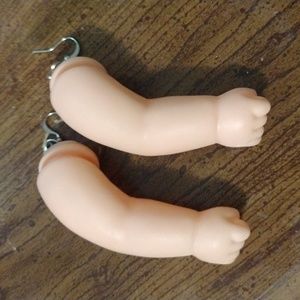 Baby doll arm earrings